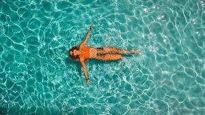 Lady relaxing in open water