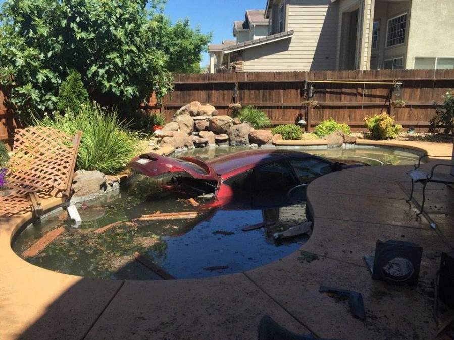 car into pool.jpg